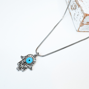COLIER HAMSA DIN OTEL INOXIDABIL CU EVIL EYE BLEU - PROTECTIE ENERGII NEGATIVE - Artynos.ro